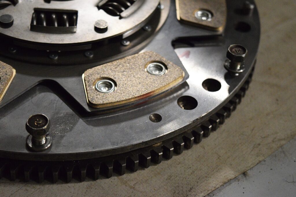 clutch clutch, disk, flywheel, automotive, steampunk, gears, car parts, machine, steel, engine, gear, repair, auto, transportation, replacement, gearshift, brown car, clutch, clutch, flywheel, car parts, car parts, car parts, car parts, car parts